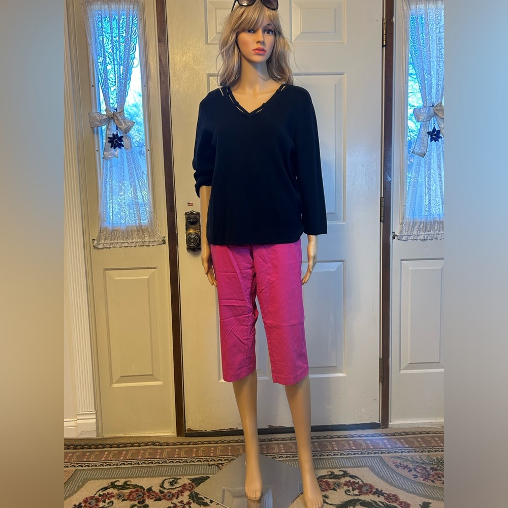 Designers black sweater top XL is matched with these pink capri by Kim Rogers 18